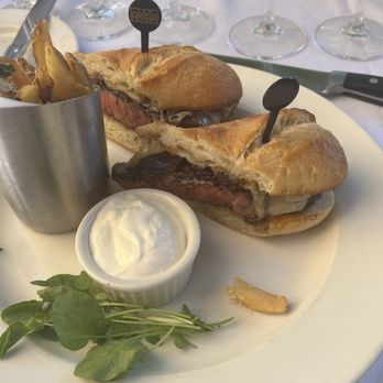 The Capital Grille - Ribeye Steak Sandwich with Caramelized Onions and Havarti with side of Parmesan Truffle Friestruffle - Steakhouses Near Me - Troy, Michigan The Capital Grille - Ribeye Steak Sandwich with Caramelized Onions and Havarti with side of Parmesan Truffle Friestruffle - Steakhouses Near Me - Troy, Michigan