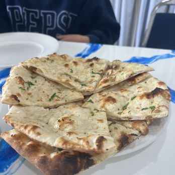 Foodie's Kitchen - Garlic naan - Indian Near Me - Oklahoma City, Oklahoma
