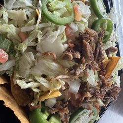Plenty of jalapeños when I requested no jalapeños. 2 ounces of meat at most. No cheese on the side. Only lettuce and chips.