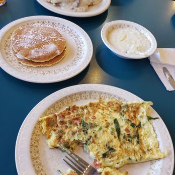 Olympic Flame Restaurant - Omelet (wrong order), pancakes, grits, & biscuits & gravy with a side of sunny side up eggs (doesnt come w eggs on top, spouse is weird lol) - Breakfast & Brunch Near Me - Myrtle Beach, South Carolina