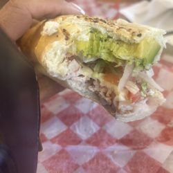 Turkey, bacon, avocado on garlic, oregano, bread with extra avocado, of course