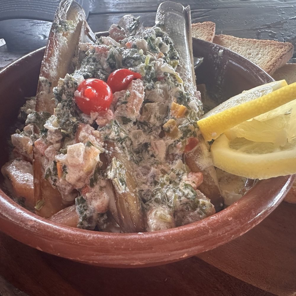 The Oyster Shack - Razor clams - hidden under sauce - Seafood Near Me - San Juan, Puerto Rico The Oyster Shack - Razor clams - hidden under sauce - Seafood Near Me - San Juan, Puerto Rico