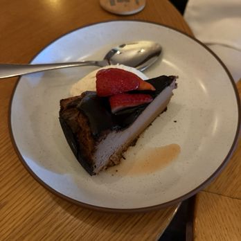 Boqueria Dupont - Tarta Vasca Chocolate ($12) - Basque chocolate cheesecake, macerated strawberries, chantilly cream - Tapas Bars Near Me - Washington, DC, District of Columbia