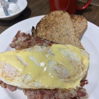 Famous Toastery - Famous hash breakfast with two eggs and wheat toast. - Breakfast & Brunch Near Me - Charlotte, North Carolina Famous Toastery - Famous hash breakfast with two eggs and wheat toast. - Breakfast & Brunch Near Me - Charlotte, North Carolina