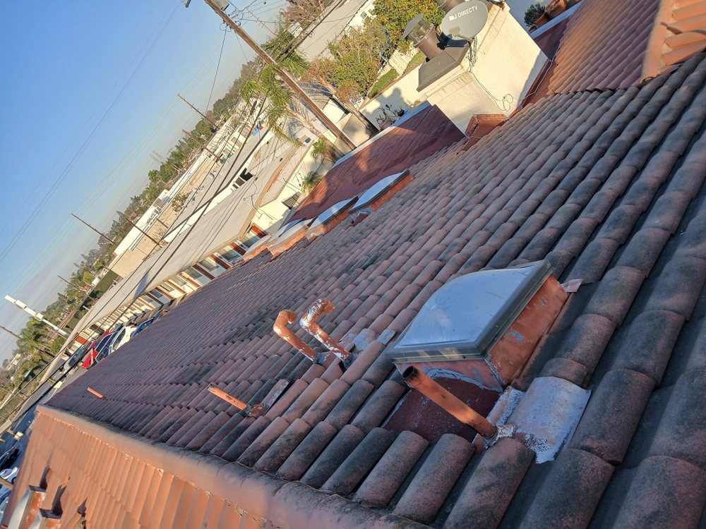 Slide of Monarch Roofing