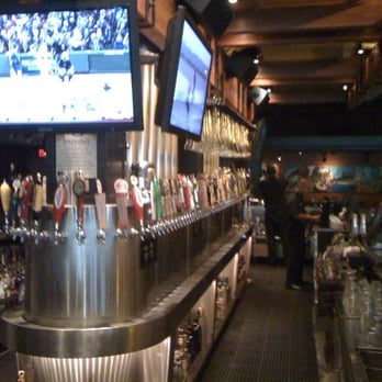 Yard House - Their beers on tap wrap all the way up and back down the bar! - New American Near Me - Honolulu, Hawaii Yard House - Their beers on tap wrap all the way up and back down the bar! - New American Near Me - Honolulu, Hawaii