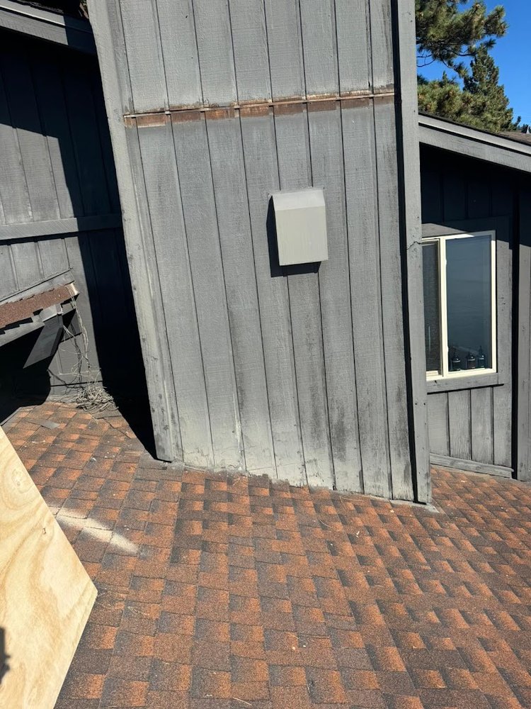 Slide of Manny's Metal Roofing