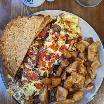 The Crabapple Cafe - Veggie omelette with extra vegetables and buttered multi grain toast. - Breakfast & Brunch Near Me - Squamish, British Columbia The Crabapple Cafe - Veggie omelette with extra vegetables and buttered multi grain toast. - Breakfast & Brunch Near Me - Squamish, British Columbia