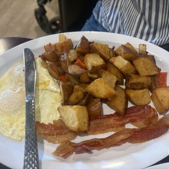 Landing Zone Cafe - Eggs and country potatoes which is part of the French Toast Combo added a side of bacon - American Near Me - Lake Elsinore, California Landing Zone Cafe - Eggs and country potatoes which is part of the French Toast Combo added a side of bacon - American Near Me - Lake Elsinore, California