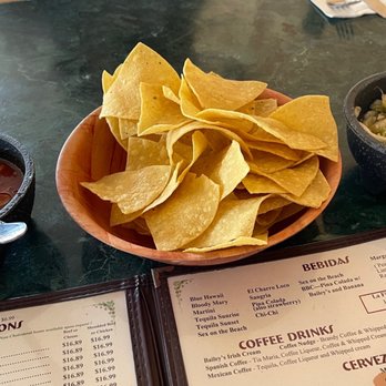 La Fiesta - Chips and salsa and.... a bowl of cabbage and chopped up onion and jalapeño... that was weird - Mexican Near Me - Fallon, Nevada