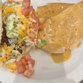 Chuy's - Taco and tostada with QUESO is also part of the Elvis plate - Bars Near Me - Harker Heights, Texas