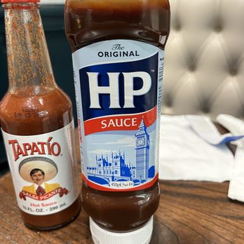 Premier Meat Pies - a bottle of hp sauce next to a bottle of sauce - Bakeries Near Me - Renton, Washington Premier Meat Pies - a bottle of hp sauce next to a bottle of sauce - Bakeries Near Me - Renton, Washington