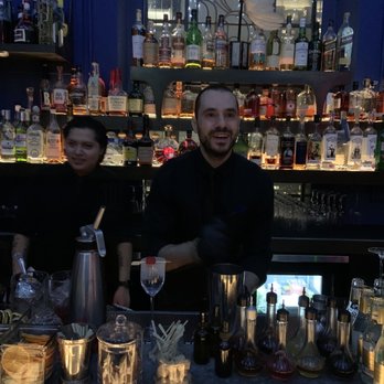 Ophelia - Without missing a beat to what he is doing, Yiannis, looked up to "mug" for the camera. Now that's a bartender! - Cocktail Bars Near Me - New York, New York Ophelia - Without missing a beat to what he is doing, Yiannis, looked up to "mug" for the camera. Now that's a bartender! - Cocktail Bars Near Me - New York, New York