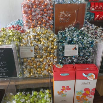 Lindt Chocolate Shop - Truffle display! - Chocolatiers & Shops Near Me - Birch Run, Michigan Lindt Chocolate Shop - Truffle display! - Chocolatiers & Shops Near Me - Birch Run, Michigan