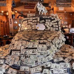 Hillbilly's Restaurant - Car filled to the "rims" with bills, bills, bills