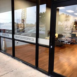 Signs and Designs - Custom Frosted Etched Window Vinyl Graphics for Artisan Vapor Company installed by sign shop company Signs and Designs tx in Rowlett TX