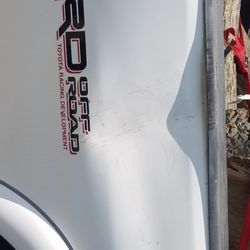 Eustis Body Shop - Large dent in box side