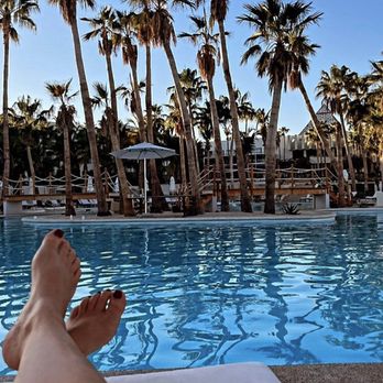 Color Me Coco - A tans best accessory is poolside. - Spray Tanning Near Me