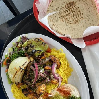 Tasty & More - Chicken kabab plate with rice salad and hummus and side of bread - Mediterranean Near Me - Kenner, Louisiana Tasty & More - Chicken kabab plate with rice salad and hummus and side of bread - Mediterranean Near Me - Kenner, Louisiana
