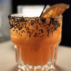 Guayacal - mezcal, fresh guava nectar, housemade sweet & sour mix, and a lava salt rim.