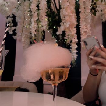 Mrs Coco - $20 champagne cloud drink which is warm champagne and cotton candy. - Cafes Near Me - Henderson, Nevada