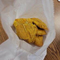 Tostones fried green plantains, get extra sauce