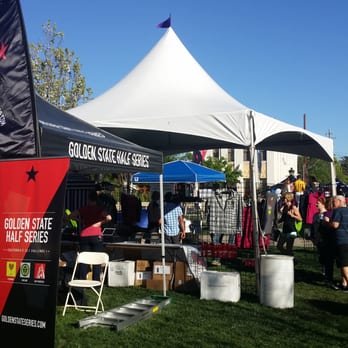 Livermore Half Marathon - Golden State series medals on display. - Races & Competitions Near Me