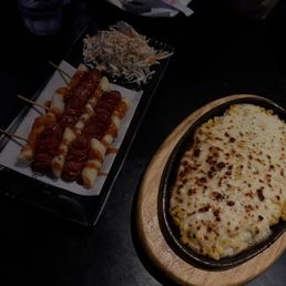 Suddeok suddeok , corn cheese