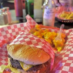 MooseKnuckles Bar & Grill - sleazy cheesy moose burger with cheesy buds