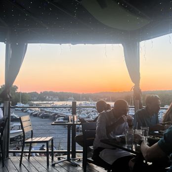 The Purple Elephant - View of the sunset from the outdoor seating. - Seafood Near Me - Northport, New York