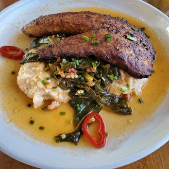 Encina - Special ordered - blackened bass but asked for over same as pork (cheesy grits and collards) PHENOMENAL!!! - New American Near Me - Dallas, Texas