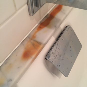 Cassa Kitchen & Bath Design & Remodeling Center - Orang/rust spots - Flooring Near Me - Shrewsbury, Massachusetts Cassa Kitchen & Bath Design & Remodeling Center - Orang/rust spots - Flooring Near Me - Shrewsbury, Massachusetts