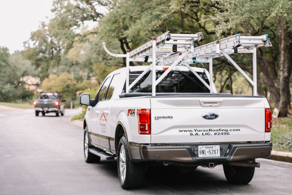 Slide of Yuras Roofing