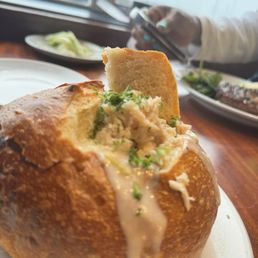 Clam Chowder w/ crab meat  in a Sourdough Bread Bowl