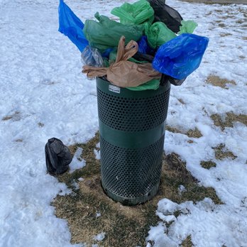 Bell Flatirons Apartments - Always overflowing dog waste bins. - Apartments Near Me - Louisville, Colorado