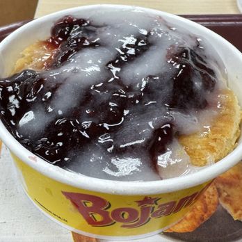 Bojangles - Blackberry Cobbler ($1.99). Just a regular biscuit with some jam and icing on the top served warm. - Southern Near Me - Cornelius, North Carolina Bojangles - Blackberry Cobbler ($1.99). Just a regular biscuit with some jam and icing on the top served warm. - Southern Near Me - Cornelius, North Carolina