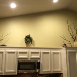 Nauman's Painting - Cabinets went from old golden oak to gorgeous white