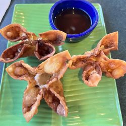 My Xuyen Vietnamese Cafe - Burnt Crab Rangoon. No filling. Did not even attempt to eat it. The restaurant is not clean and half of it looks like a thrift store.