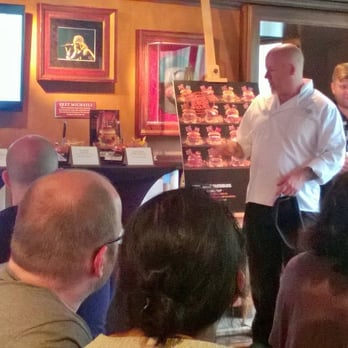 Hard Rock Cafe Amsterdam - Chef talking us through the World Burger Tasting Tour Event burger ingredients - American Near Me - Amsterdam, New Hampshire