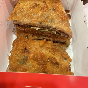 Nan Xiang Express  - Scallion Pancake w/ beef. There is a hoisin or plum sauce inside, but a side of dipping sauce would've been nice. - Shanghainese Near Me - Boston, Massachusetts