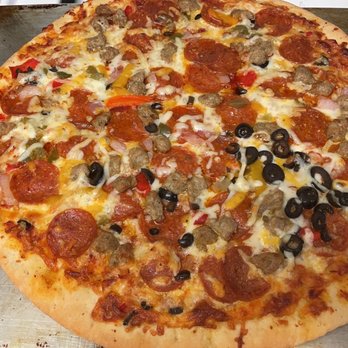 ALDI - Supreme 16" pizza for less than $7! It was delicious. (I reorganized the olives for my daughter) - Grocery Near Me - Burbank, California