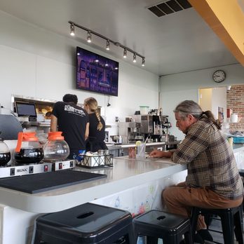 The Small Café - a man sitting at the counter - Breakfast & Brunch Near Me - Long Beach, California The Small Café - a man sitting at the counter - Breakfast & Brunch Near Me - Long Beach, California