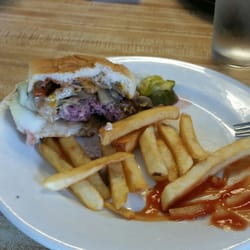 Spruce Corner Restaurant - This burger almost didn't make the photo. Perfectly cooked swiss mushroom burger wirh crispy fries. Done right!!!