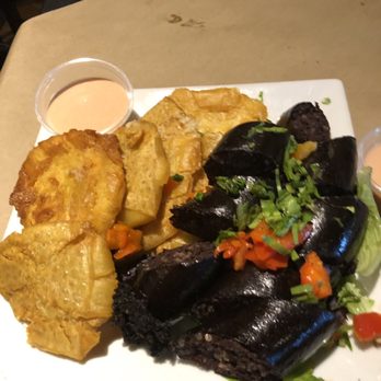 Rice and Beans - Fried Breadfruit with blood sausage plus their garlic mayo-ketchup sauce; my wife said it was delicious! - Puerto Rican Near Me - Wesley Chapel, Florida
