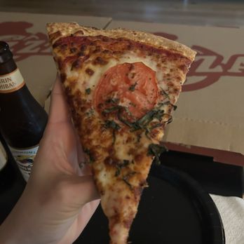 Reno's Pizzeria & Restaurant - Slice size - Pizza Near Me - Burbank, California Reno's Pizzeria & Restaurant - Slice size - Pizza Near Me - Burbank, California