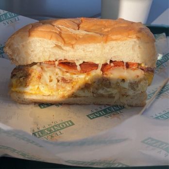 Texas Honey Ham - The breakfast bun it has two eggs sausage bacon and cheese - Breakfast & Brunch Near Me - Georgetown, Texas
