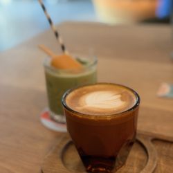 Acorn Cafe - Flat White and Melon Matcha Latte