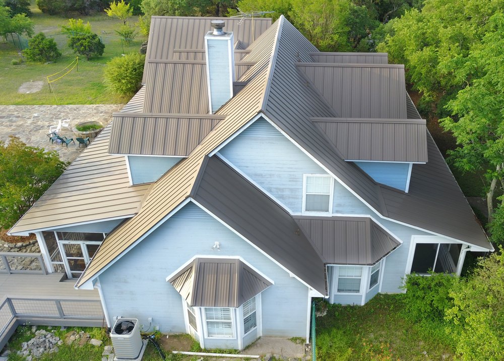 Slide of Green Knight Metal Roofing