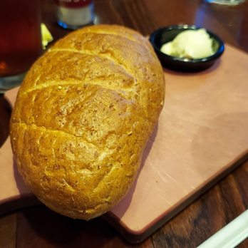 LongHorn Steakhouse - Just one of the hot loafs of bread that kept magically kept appearing on the table. - Steakhouses Near Me - Yukon, Oklahoma LongHorn Steakhouse - Just one of the hot loafs of bread that kept magically kept appearing on the table. - Steakhouses Near Me - Yukon, Oklahoma
