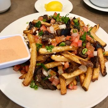 Sprigs Grille Restaurant - Natural Cut Kalbi Fries with Rooster fry sauce - Seafood Near Me - Kapolei, Hawaii